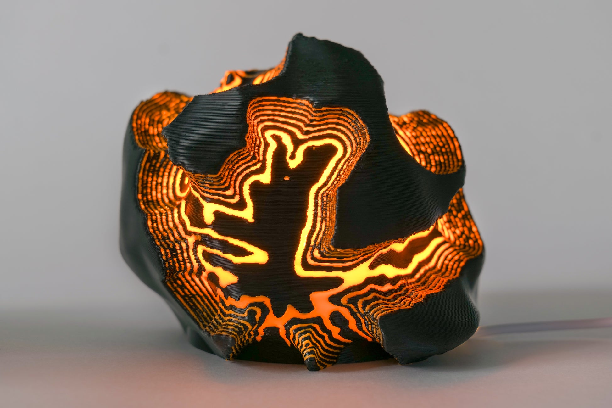 Black lamp with orange detailing 