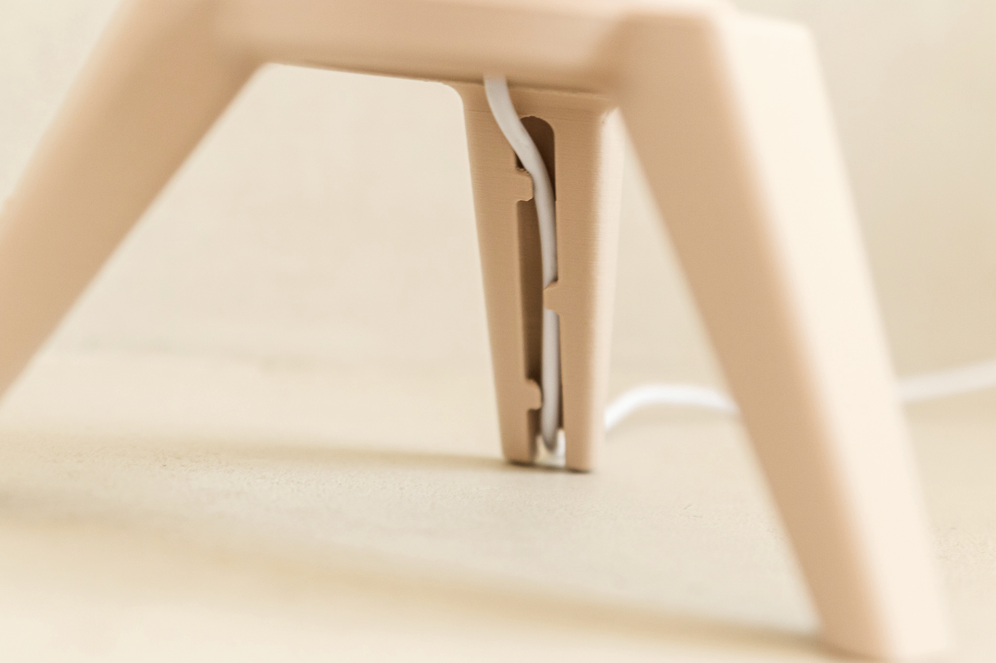 Close-up of a beige lamp base